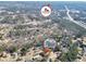 Sprawling aerial shot of a beautiful home close to McDonough's Main Street, nestled in a wooded neighborhood at 701 Monticello Ln, Mcdonough, GA 30253
