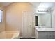 Spacious bathroom features a large vanity with modern fixtures and ample storage space and countertop at 701 Monticello Ln, Mcdonough, GA 30253