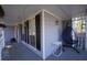 Cozy front porch features stylish seating, offering a relaxing outdoor space at 701 Monticello Ln, Mcdonough, GA 30253