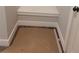 A modern entryway featuring a coat closet and trim accents at 877 Highway 101 N, Dallas, GA 30157