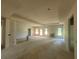 Expansive living room featuring a tray ceiling, fireplace, and multiple windows for natural light at 877 Highway 101 N, Dallas, GA 30157