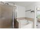 Features of this bathroom include a combined shower and tub at 1237 Park Pass Way, Suwanee, GA 30024