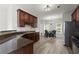 Modern kitchen with granite countertops and stainless steel appliances that connect to dining area at 1237 Park Pass Way, Suwanee, GA 30024