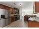 Spacious kitchen featuring stainless steel appliances and granite countertops at 1237 Park Pass Way, Suwanee, GA 30024