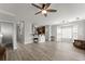 Open-concept living room features hardwood floors and great natural light at 1237 Park Pass Way, Suwanee, GA 30024
