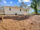 View of backyard with lush greenery and side of home at 2811 Mango Nw Cir, Atlanta, GA 30318