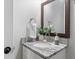 Close up of modern bathroom with granite countertop and brushed metal faucet at 2811 Mango Nw Cir, Atlanta, GA 30318
