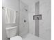Clean bathroom with modern tile, glass shower door and modern fixtures at 2811 Mango Nw Cir, Atlanta, GA 30318