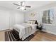 Neutral bedroom with hardwood floors, stylish rug and natural lighting at 2811 Mango Nw Cir, Atlanta, GA 30318