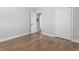 Bright bedroom with hardwood floors, neutral paint, and ample closet space at 2811 Mango Nw Cir, Atlanta, GA 30318