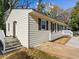 Charming one-story home with newly renovated siding and landscaping at 2811 Mango Nw Cir, Atlanta, GA 30318