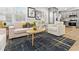 Modern living room with hardwood floors, neutral furniture, and an inviting open space to the kitchen at 2811 Mango Nw Cir, Atlanta, GA 30318
