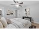 Cozy primary bedroom with a minimalist design, wood floors and ceiling fan at 2811 Mango Nw Cir, Atlanta, GA 30318