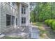 Exterior view of a home with a nice patio area and potential for outdoor entertaining at 4319 Silver Peak Pkwy, Suwanee, GA 30024