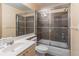 Well-kept bathroom with a glass-enclosed shower over tub and modern fixtures at 4319 Silver Peak Pkwy, Suwanee, GA 30024