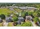 Aerial view of a neighborhood with houses, trees, and greenery, providing an overview of the community at 4360 Havenridge Pl, Cumming, GA 30041