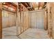 Unfinished basement space showing exposed framing and concrete walls, ready for personalization and customization at 4360 Havenridge Pl, Cumming, GA 30041