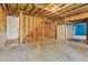 Unfinished basement, ready for customization, showcasing exposed framing and concrete flooring at 4360 Havenridge Pl, Cumming, GA 30041