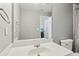Bathroom with white vanity, framed mirror, toilet, and a shower/tub combination with shower curtain at 4360 Havenridge Pl, Cumming, GA 30041
