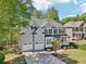 Captivating home with stone accents, a covered porch, and an attached two-car garage at 4360 Havenridge Pl, Cumming, GA 30041