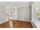 Open-concept living area boasts hardwood floors and ample natural light at 4360 Havenridge Pl, Cumming, GA 30041