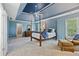 Spacious primary bedroom with tray ceiling and a sitting area, exuding luxury at 4360 Havenridge Pl, Cumming, GA 30041