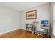 Comfortable office space with sleek desk and matching bookshelf, showcasing an organized workspace at 4360 Havenridge Pl, Cumming, GA 30041