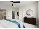 Bright bedroom with an ensuite bathroom, ceiling fan, and modern decor at 439 Mezzo Ln # 88, Alpharetta, GA 30009