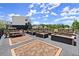 Community garden featuring raised garden beds near modern townhomes on a sunny day at 439 Mezzo Ln # 88, Alpharetta, GA 30009