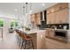 Spacious kitchen featuring stainless steel appliances, pendant lighting, and island seating at 439 Mezzo Ln # 88, Alpharetta, GA 30009