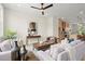 Open-concept living room with hardwood floors, a ceiling fan, and access to the kitchen at 439 Mezzo Ln # 88, Alpharetta, GA 30009
