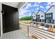 Balcony view of new construction townhomes and a quiet street at 654 Soul Aly # 102, Alpharetta, GA 30009