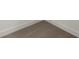 Close-up of neutral-toned carpet and white baseboards at 673 Soul Aly # 146, Alpharetta, GA 30009