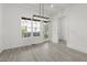 Dining Room with a view to the exterior at 673 Soul Aly # 146, Alpharetta, GA 30009