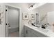 Bright bathroom features double sinks, grey cabinetry, and recessed lighting at 3548 Cedarvale Ct, Powder Springs, GA 30127