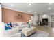 Inviting living room with a comfortable sectional sofa, decorative pillows, and stylish decor at 3548 Cedarvale Ct, Powder Springs, GA 30127