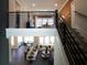 Open floor plan with stairs leading to additional living spaces, creating a spacious and airy feel at 3548 Cedarvale Ct, Powder Springs, GA 30127