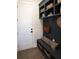 Functional mudroom with built-in storage, a bench, and convenient access to the home at 3548 Cedarvale Ct, Powder Springs, GA 30127