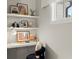 Charming workspace featuring a cozy chair, modern lighting, and stylish decor at 3548 Cedarvale Ct, Powder Springs, GA 30127