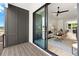View of the spacious balcony leading into the cozy living room through large sliding glass doors at 656 Soul Aly # 101, Alpharetta, GA 30009