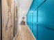 Hallway with hardwood flooring and decorative paneling at 7678 Gray Pointe Dr, Lithonia, GA 30058