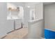 Bright laundry room with washer, dryer, and shelving for storage at 7678 Gray Pointe Dr, Lithonia, GA 30058