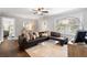 Inviting living room with hardwood floors, neutral decor, and a cozy couch facing an open hallway at 2171 Plantation Ln, Chamblee, GA 30341
