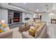 Cozy basement living area with a fireplace, sofas, coffee table and wet bar in view at 2347 Univeter Rd, Canton, GA 30115