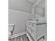 Bathroom features a white single sink vanity and a large mirror at 2347 Univeter Rd, Canton, GA 30115