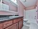 Traditional bathroom featuring a granite countertop and shower-tub combination at 2347 Univeter Rd, Canton, GA 30115