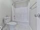 Bathroom featuring a toilet, shower and bathtub combination at 2347 Univeter Rd, Canton, GA 30115