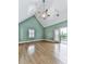 Spacious bedroom features vaulted ceiling, French doors to balcony, and neutral decor at 2347 Univeter Rd, Canton, GA 30115