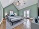 Spacious bedroom features vaulted ceiling, French doors to balcony, and neutral decor at 2347 Univeter Rd, Canton, GA 30115