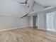 A spacious bedroom with vaulted ceilings features hardwood floors and neutral paint at 2347 Univeter Rd, Canton, GA 30115